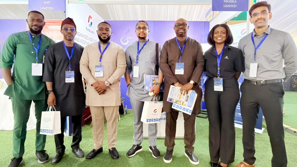 Photo of the RusselSmith team and visitors the RusselSmith's booth at the NLNG and Partners Conference
